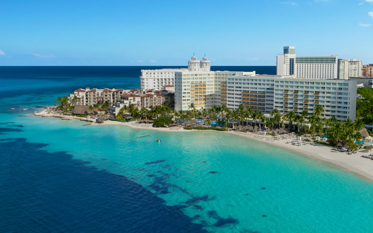 White-sand beach and Caribbean Sea at Luxury Sands Cancún Resort & Spa