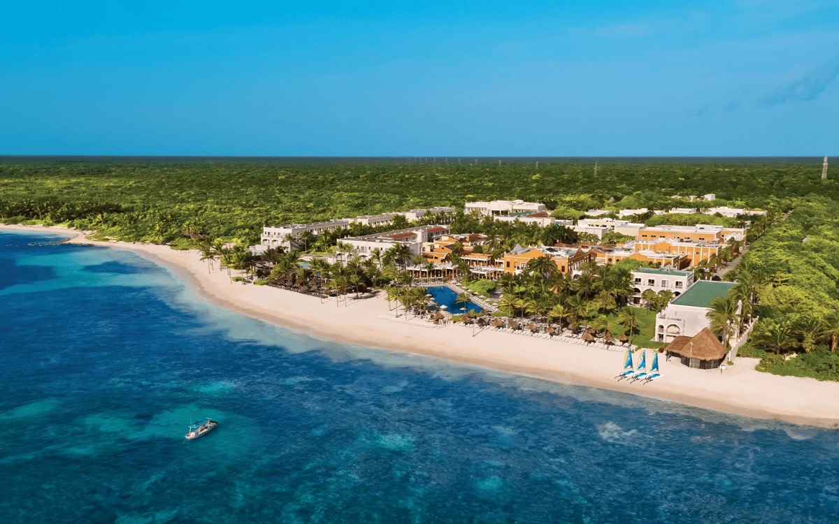 Beachfront pools and tropical gardens at Luxury Tulum Resort & Spa