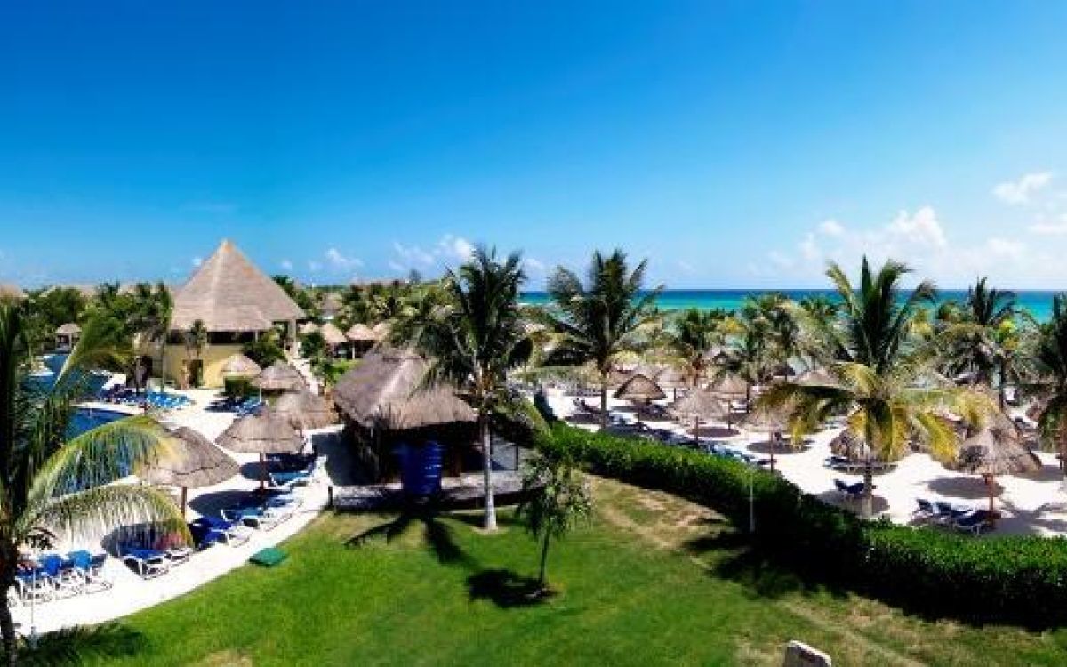Aerial view of the pools, water park, and tropical grounds at Sandos Caracol Nature Resort