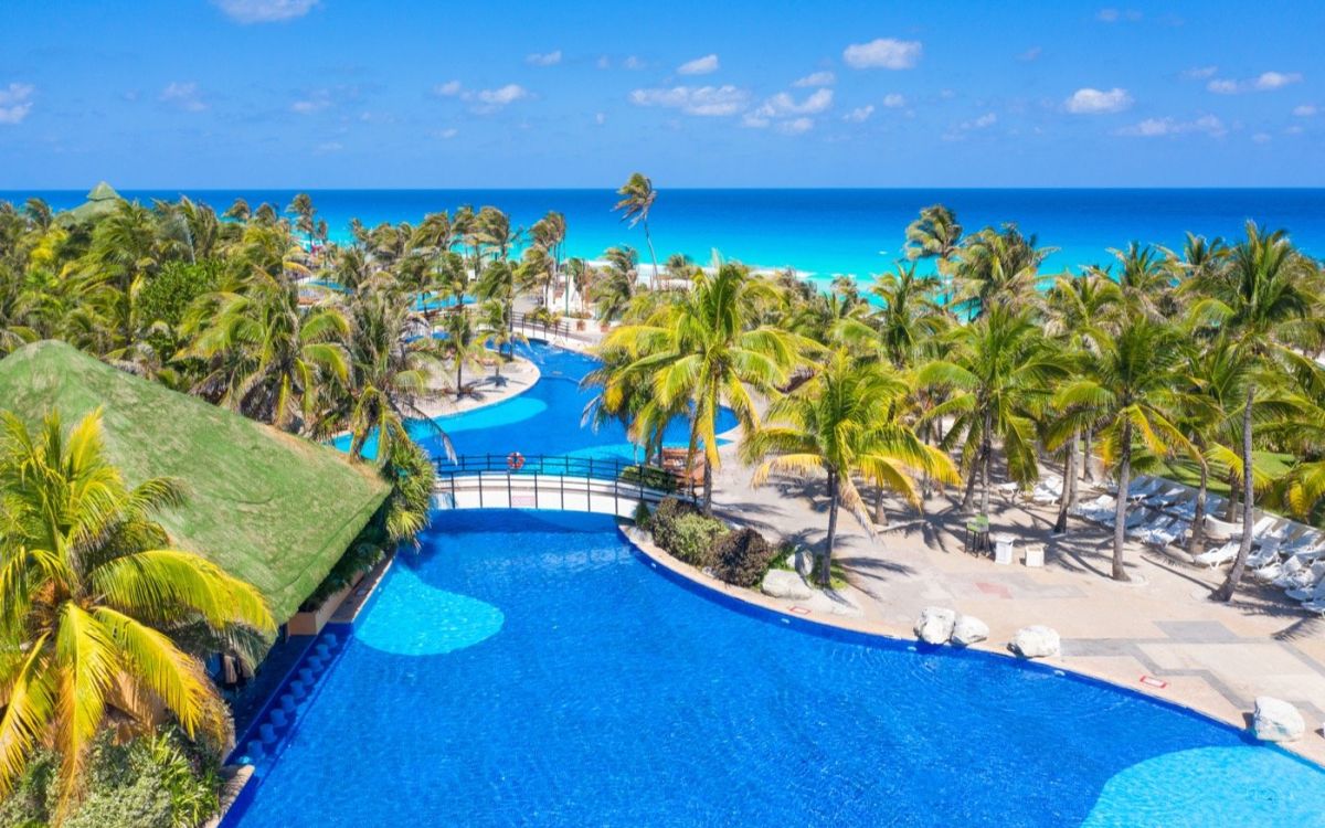 Caribbean beachfront, pools, and resort grounds at Grand Oasis Cancún